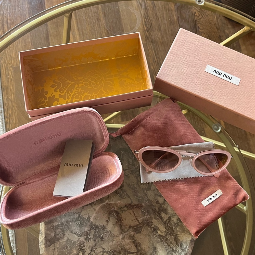 Miu Miu Oval Sunglasses..this season!!! Comes with ALL original cases